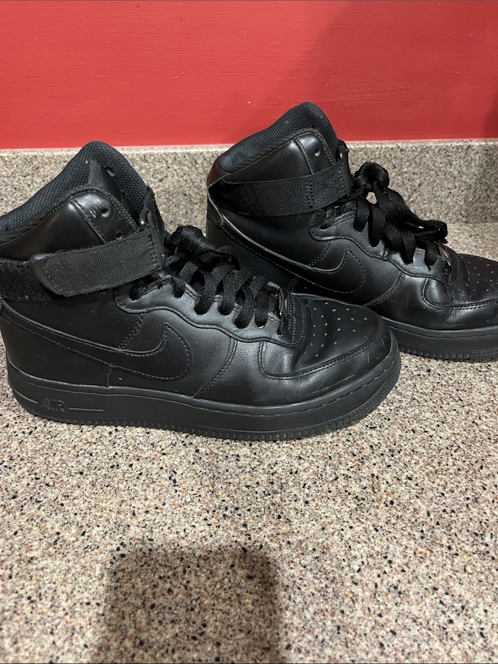 Nike Air Force 1 High “Triple Black” Women’s size 8.5.